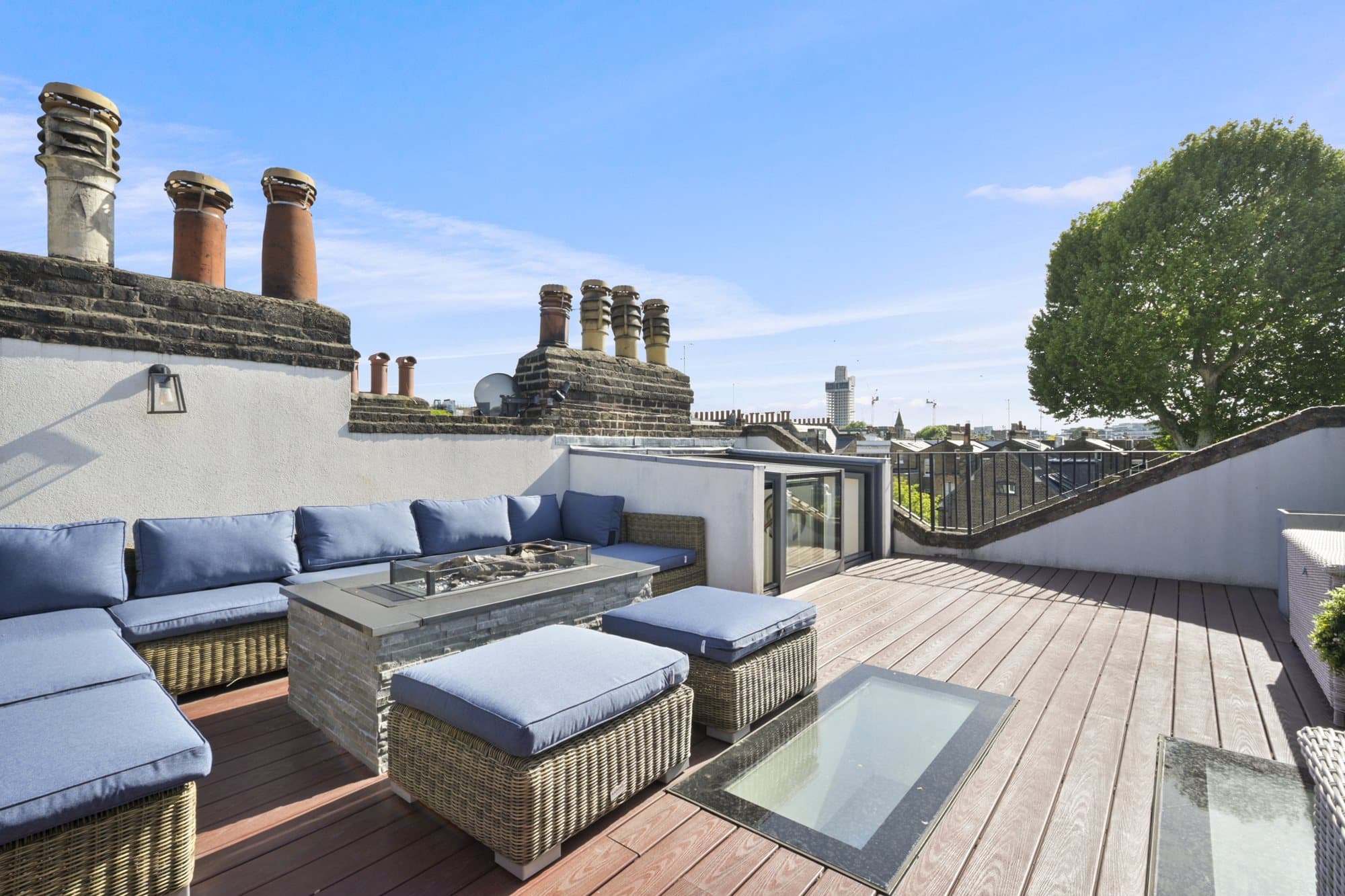 Kitchen island, staircase and garden beyond at Alma Terrace