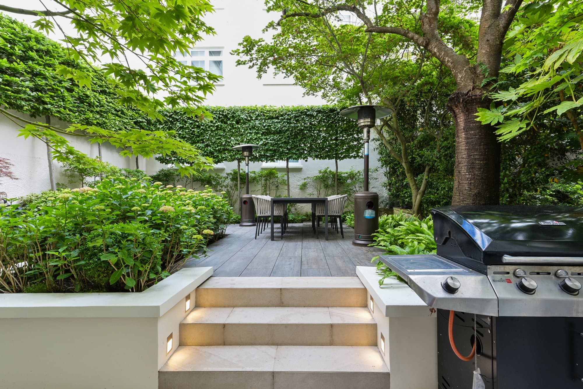 Garden terrace with planting and stone steps