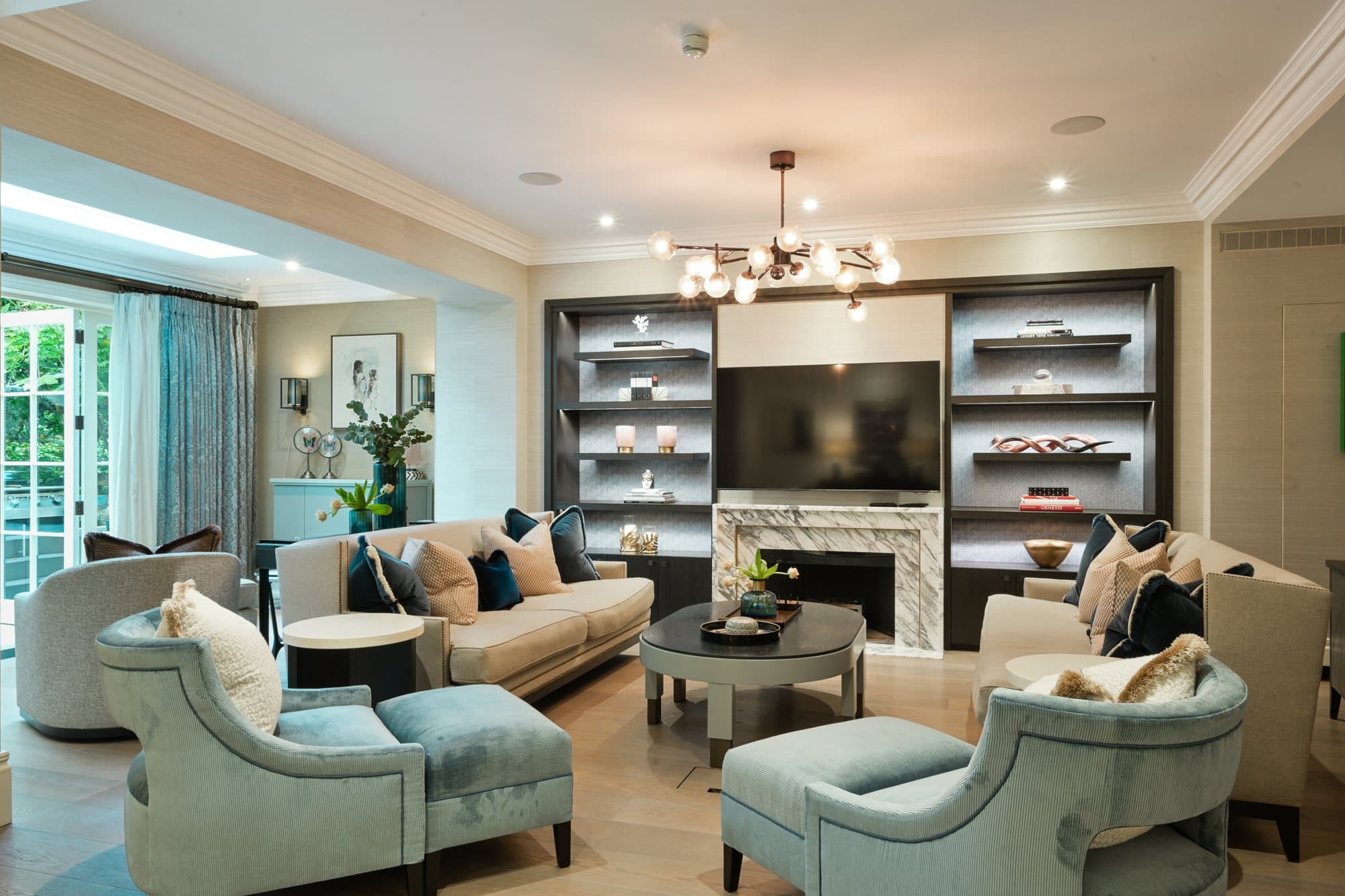 Reception room with bookshelves and fireplace