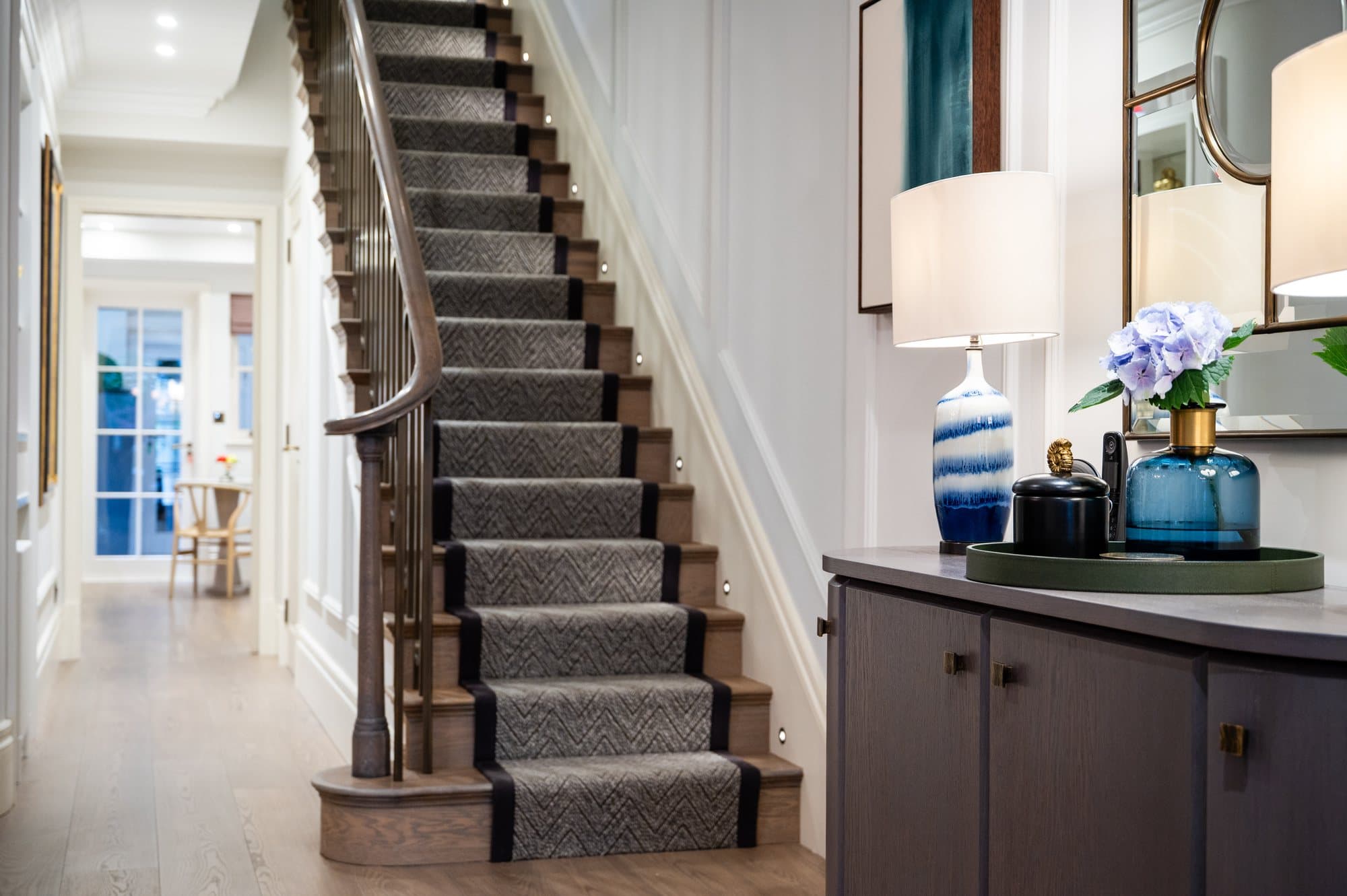 Stair run with console and lamps