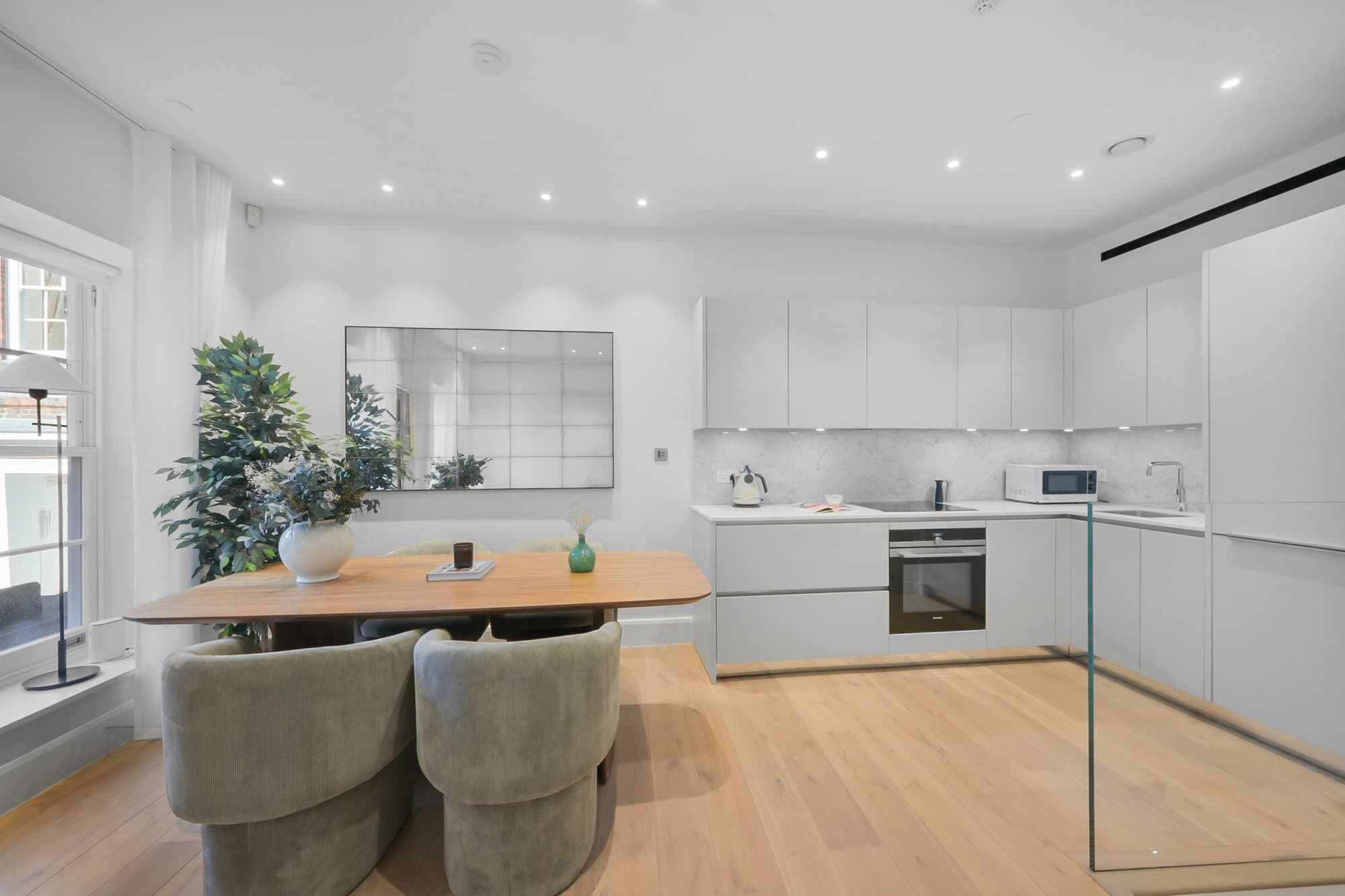 Finished kitchen and dining space in a central London apartment